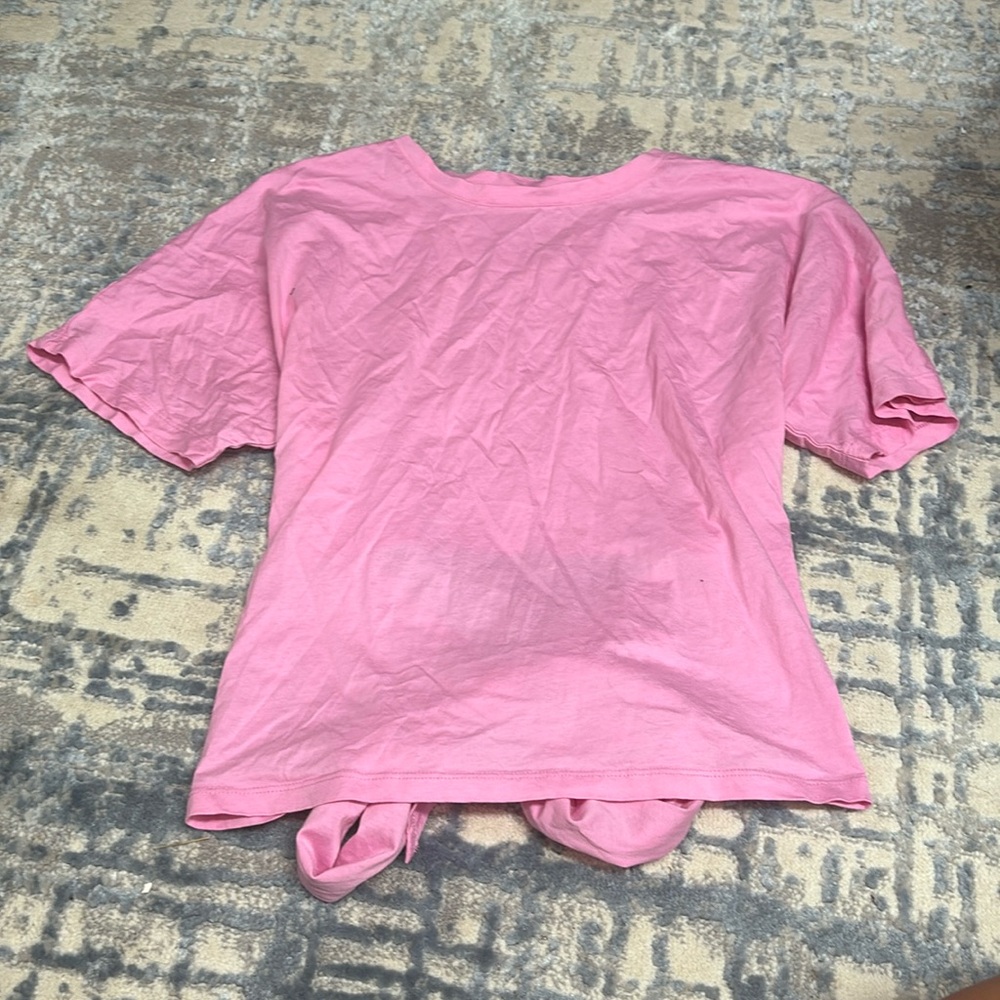 Pink blouse with a tie